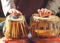 Tonalis Community Music Trainee practising Tablas