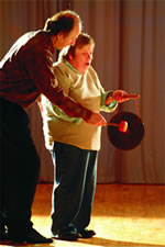 Michael Deason-Barrow working with woman with downs syndrome 